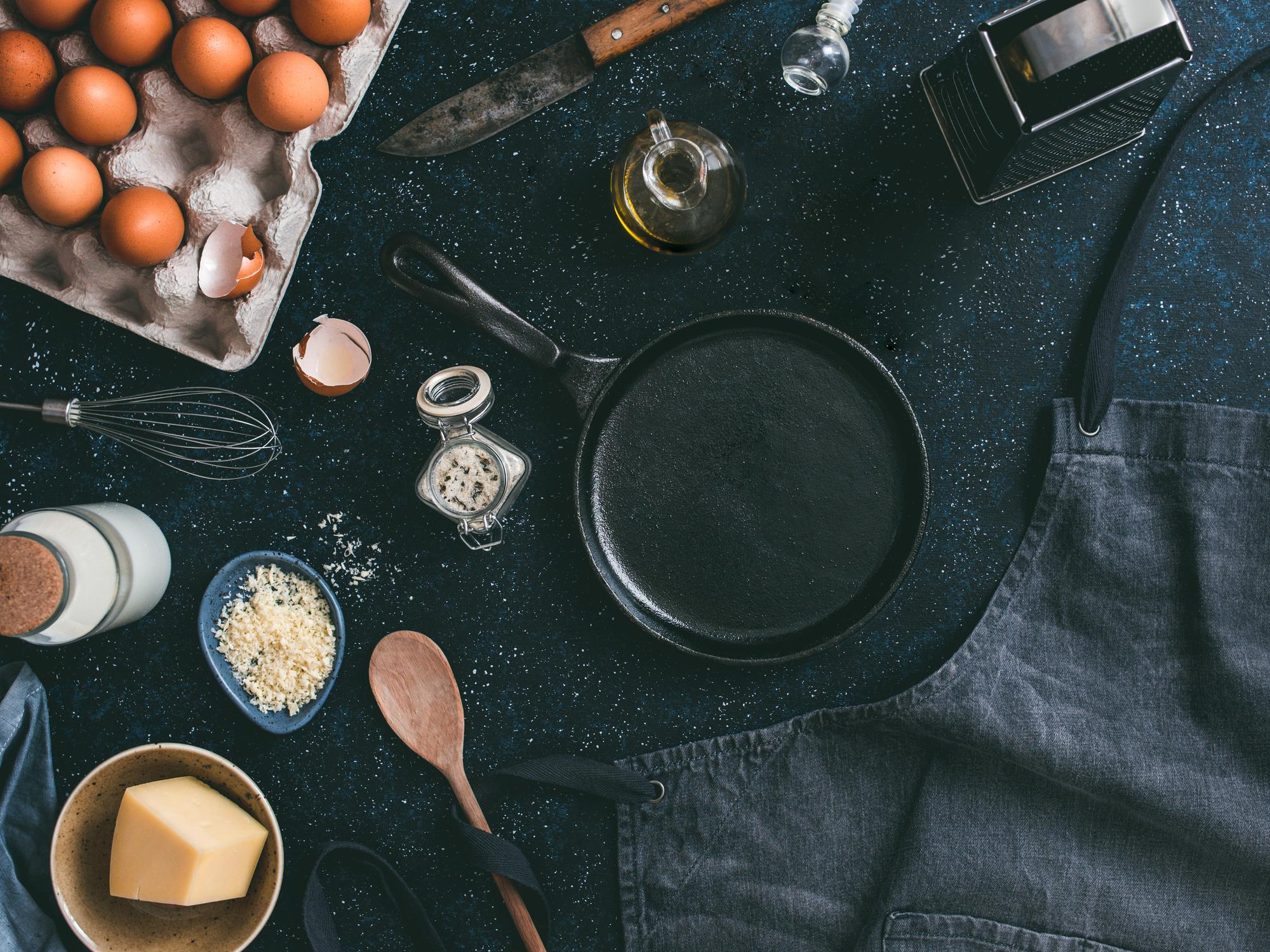 modern culinary workspace with tools and plated dish